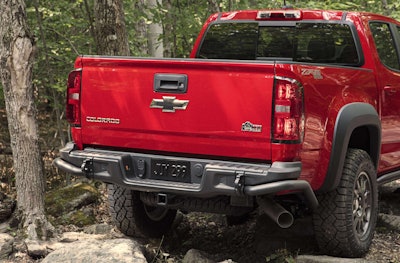 AEV-designed stamped steel rear bumpers house integrated recovery points and chassis-mounted tubular corner protection.