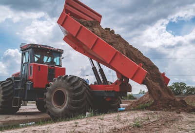 The new dump beds for ARDCO’s articulating trucks, like the AMT 400 shown above, achieve a 70-degree angle at full dump height.