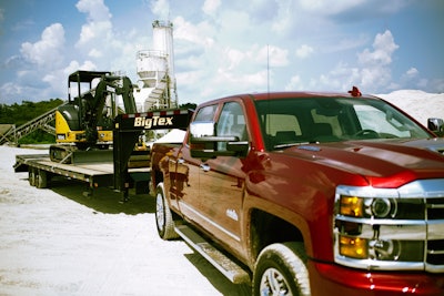 chevy silverado with bigtex trailer and john deere equipment