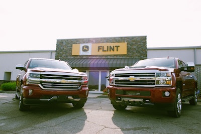 chevy silverados outside flint john deere