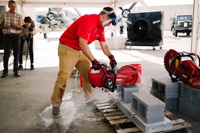 The DSH 600-X in use with the DSH-P integrated water pump. The pump delivers OSHA-compliant dust suppression with a 5-gallon bucket.