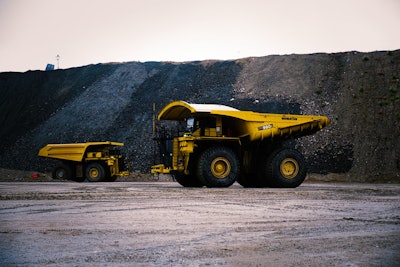 A Komatsu 980E, foreground, and a Komatsu 930 are operated autonomously at Komatsu’s Arizona Proving Grounds. Photos: Wayne Grayson