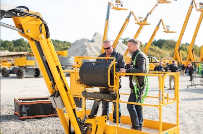 Haulotte HA61 LE PRO electric articulating boom with two workers on platform