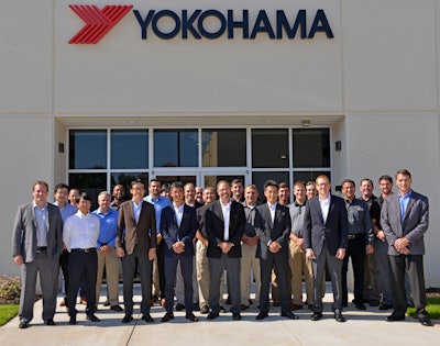 Shinichi Takimoto, president and CEO of Yokohama Tire Corporation of North America (front row, fourth from left), joined employees for the October 1 opening of the Yokohama Development Center America in Cornelius, North Carolina. Other Yokohama dignitaries include Tetsuya Kuze, executive vice president of YCNA (third from left), and Shoichiro (Sho) Matsuda, YCNA vice president of corporate technical (sixth from the left).