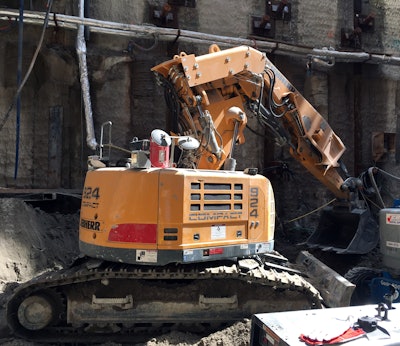 This Liebherr R924 excavator is working on the Eglinton Crosstown Light Rail Transit project under construction in downtown Toronto, Canada. The $8.5 billion Canadian project is currently the largest in the country, and will provide 19 kilometers of underground and above ground rail with a capacity of 15,000 passengers per hour.