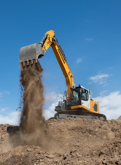 Crawler Excavator Dumping Dirt