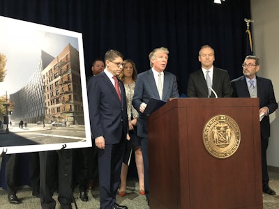 Manhattan District Attorney Cyrus Vance Jr. announces charges against two subcontractor employees after a mini crane falls and injures two workers. Credit: Manhattan D.A.’s office