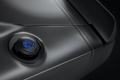 The Satin Black fuel door of the 1968 Dodge “Super Charger” Concept is embellished with a custom-milled aluminum “Hellephant” medallion. Vehicle graphics and badging are Satin Black vinyl decals, including the classic tail stripes at the rear.