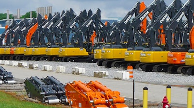 New John Deere and Hitachi excavators at manufacturing plant