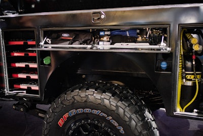 Service-body-type storage hiding beneath that raised fender.
