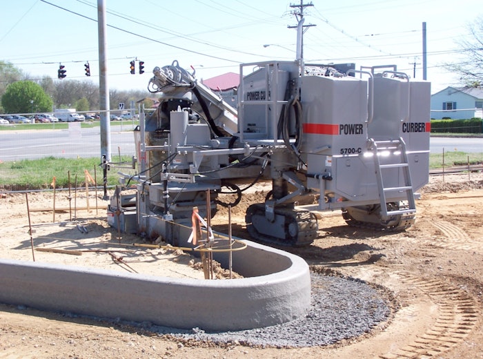 Power Curbers’ 5700-C curb-and-gutter machine features three-crawler steering that enables tight turns, within a 2-foot radius.