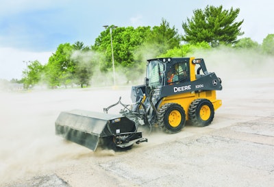 John Deere 320G with angle broom