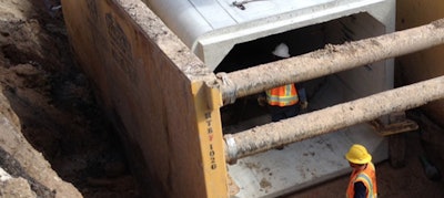 Construction workers using Underground Safety Equipment