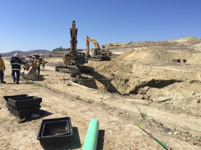 Fire department personnel at the scene of a trench collapse May 9 in California that killed a construction worker. Credit: Orange County Fire Authority