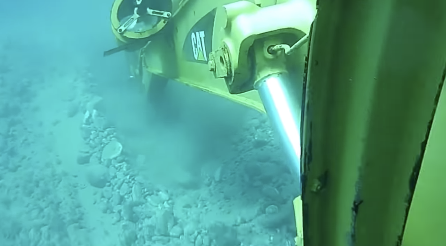 This Cat excavator makes its living digging at the bottom of the ocean