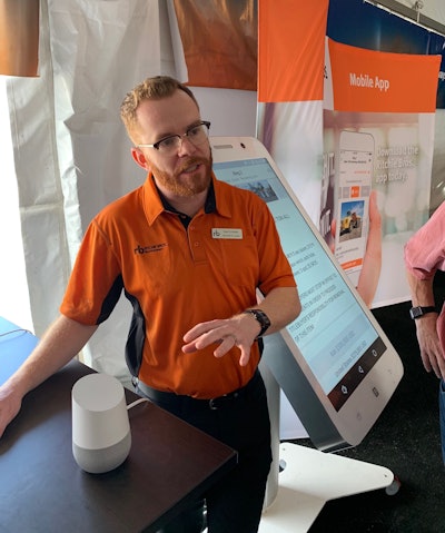 Cumiskey with a Google Home smart speaker. Photo: Tom Jackson