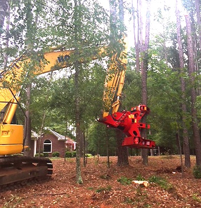 Fecon FRS15 shears attachment on an excavator