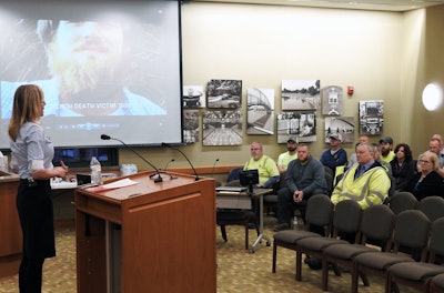 Cindy Hess talks to city workers in Fairfield, Ohio.