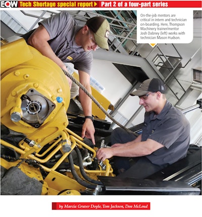 Thompson Machinery trainer working with a technician
