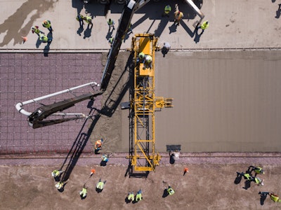 Terex Bid-Well demonstrates its new 3600CR remote-control paver during its annual service school.