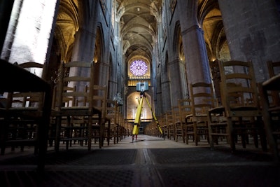 3D laser scanners, like this Trimble TX8 set up in the Notre-Dame de Rodez cathedral, give us clues to past construction, monitor movement and changes, and create a digital record for future architects and historians. (Photo credit: Christophe BOIS – Géomètre Expert