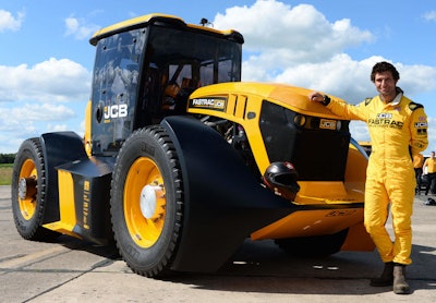 The world-record-breaking JCB Fastrac with its driver Guy Martin.