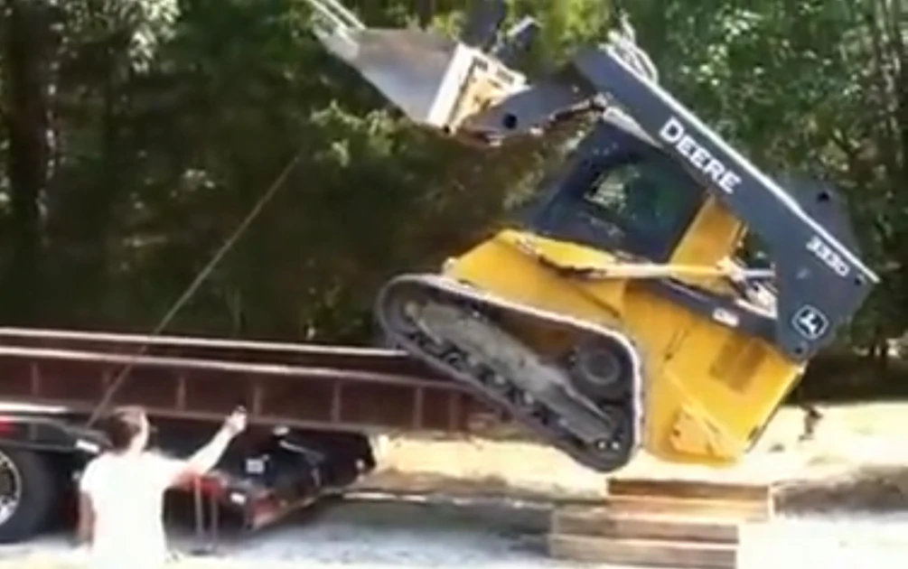Compact Track Loader Crash Watch the precarious unloading of a compact track loader | Equipment World