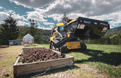 Danuser Mega Mixer filling raised garden beds