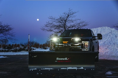 Truck with SnowEx plow and headlights