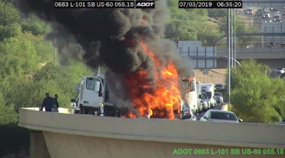 Dump truck ablaze on highway