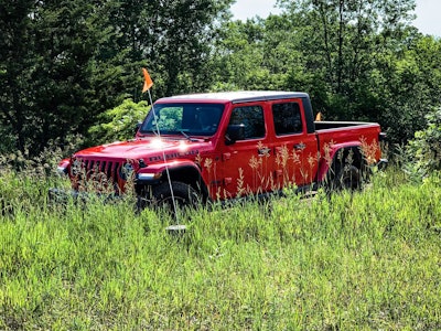 2020 Jeep Gladiator pickup truck in grassy area