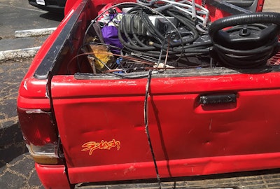 A Mississippi DOT worker saw this pickup truck with copper wire attached to the back of it and a light pole on Interstate 20 in Jackson.