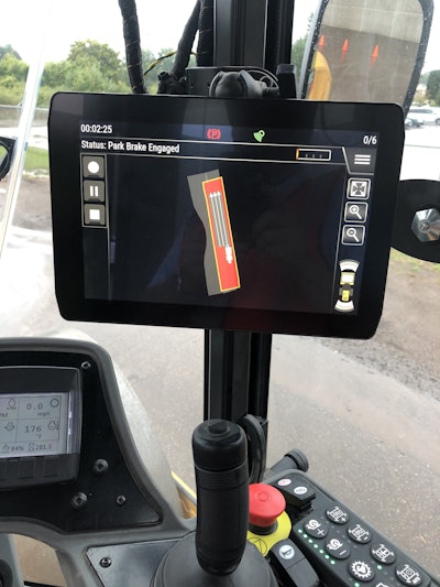 With the touch of the screen, the operator can outline the boundaries and path of a B-Series soil compactor with Cat’s new Command for Compaction system. Photo by Don McLoud