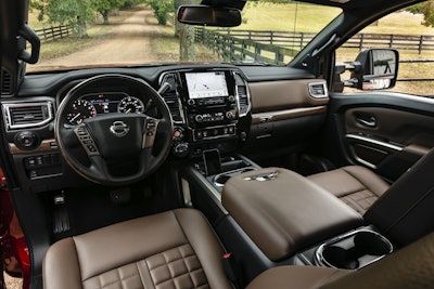 TITAN XD PRO-4X, SL and Platinum Reserve models include a new Integrated Command Center with 9.0-inch touchscreen. Other Platinum Reserve interior touches include leather seats with Platinum Reserve branding, heated rear seats, leather steering wheel with wood insert, chrome accent trim pieces, and a leather wrapped center console lid with contrast stitching and Platinum Reserve logo.