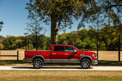 TITAN XD Platinum Reserve models feature a number of premium touches on the exterior, including Platinum Reserve badging, dark painted and machined clad wheels, satin chrome grille, tailgate and fog lamp finisher, and two-tone paint.