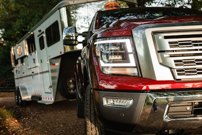 frnot of Nissan 2020 Titan XD pulling trailer