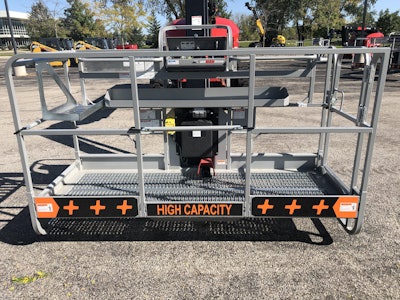 The platform for the Manitou TJ 65+ has a capacity of 900 pounds and holds up to three people.