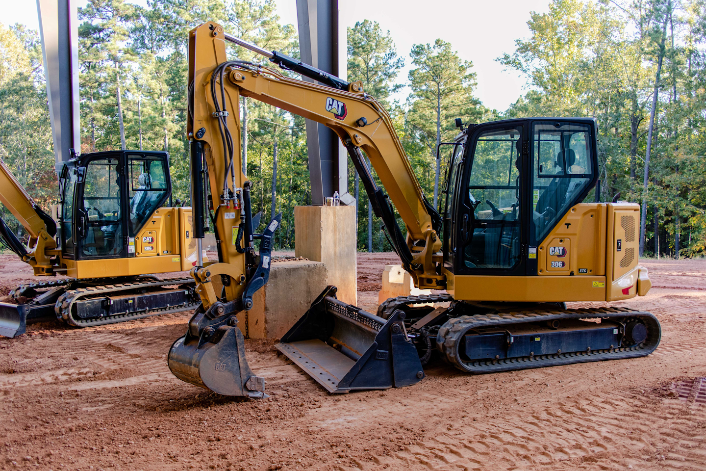 Stick Steer Travel On Cat S New 306 Cr Xtc Excavator Gives You Skid Steer Functionality In A Digging Machine Equipment World Stick Steer Travel On Cat S New 306 Cr Xtc Excavator Gives You Skid Steer Functionality In A Digging Machine Equipment World