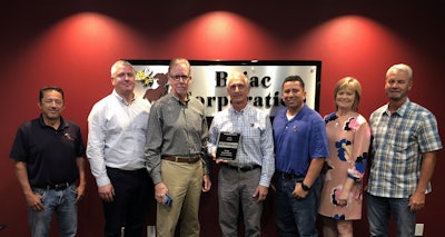 With Bejac’s leadership team (from left to right): Braulio Saravia, Los Angeles sales representative; Robert Cycon, general manager, Tom Jackson, Equipment World; Ron Barlet, president; Hugo Mejia, service manager; Kim Smith-Grime CFO and vice president; Curt Geisbush, Los Angeles sales representative.