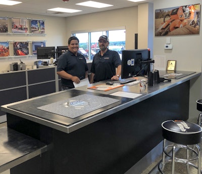 From left, Anthony Geary and rental manager Charlie Childers at the Oklahoma City dealership.