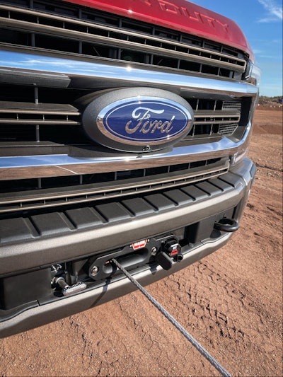 The new Ford Performance Parts winch by Warn comes with 12,000 pounds of winching power and will be available as a factory-orderable option or dealer-installed after-sale accessory for both gas and diesel-powered Super Duty Tremor pickups.