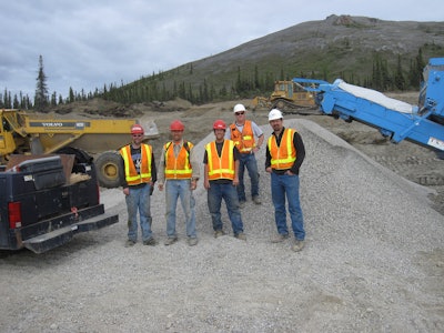 Toby Drake (right) and crew at the pit.