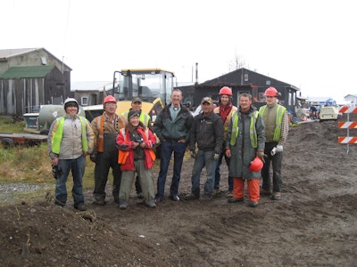 Wayne Drake, company founder (center), with his crew.