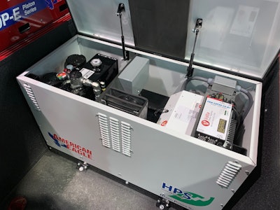 A flip top lid gives you easy access to the battery and controller (right) and the hydraulic pump (left).