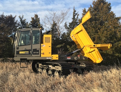 Terramac RT7R crawler carrier in field with trees