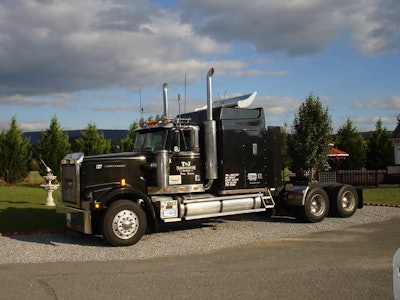 Timothy Barrett’s 1997 Western Star has been sitting idle for a few weeks after he hung up the keys when business soured and rates went south, he said. He’s been working a temporary job at Walmart until his loads come back.