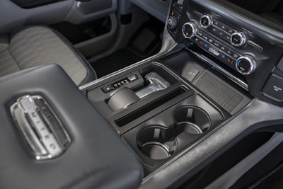 The all-new F-150 features and an available stowable shifter that easily folds into the center console of the all-new F-150 with the push of a button and allows full access to the large Interior Work Surface when in park.