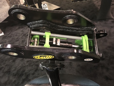 Automatically hydraulically activated springs hold the attachment in place even when misconnection or cylinder failure occurs, Geith says.