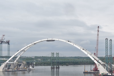The newly freestanding arch for the future westbound bridge of the I-74 Mississippi River Bridge. Used with permission © 2020 Iowa DOT