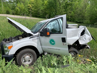 This Ohio Department of Transportation truck was hit by a tractor trailer in Crawford County, sending a worker to the hospital. The pickup was hauling an arrow board for a rolling work zone on U.S. 30. Photo credit: Ohio DOT